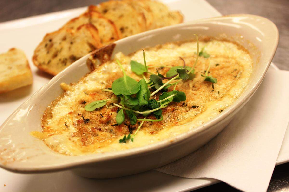 JULIAN BRUNT/SPECIAL TO THE SUN HERALDA seafood gratin can be an appetizer or entrée.