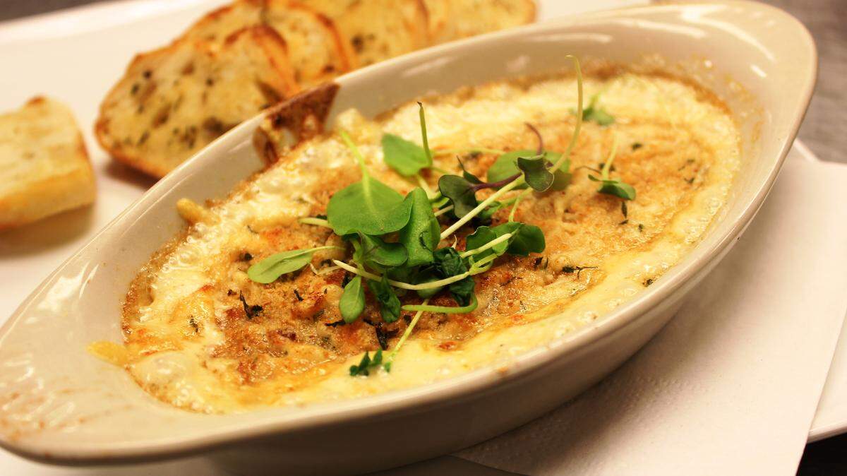 JULIAN BRUNT/SPECIAL TO THE SUN HERALDA seafood gratin can be an appetizer or entrée.