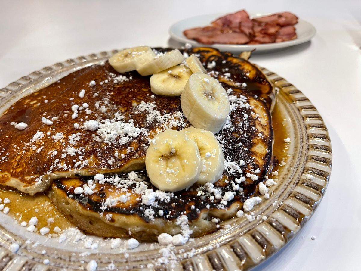 Bananas Foster pancakes with fresh bananas and caramel sauce are one of the choices for breakfast at Cosmos at Pearl Hotel in Bay St. Louis