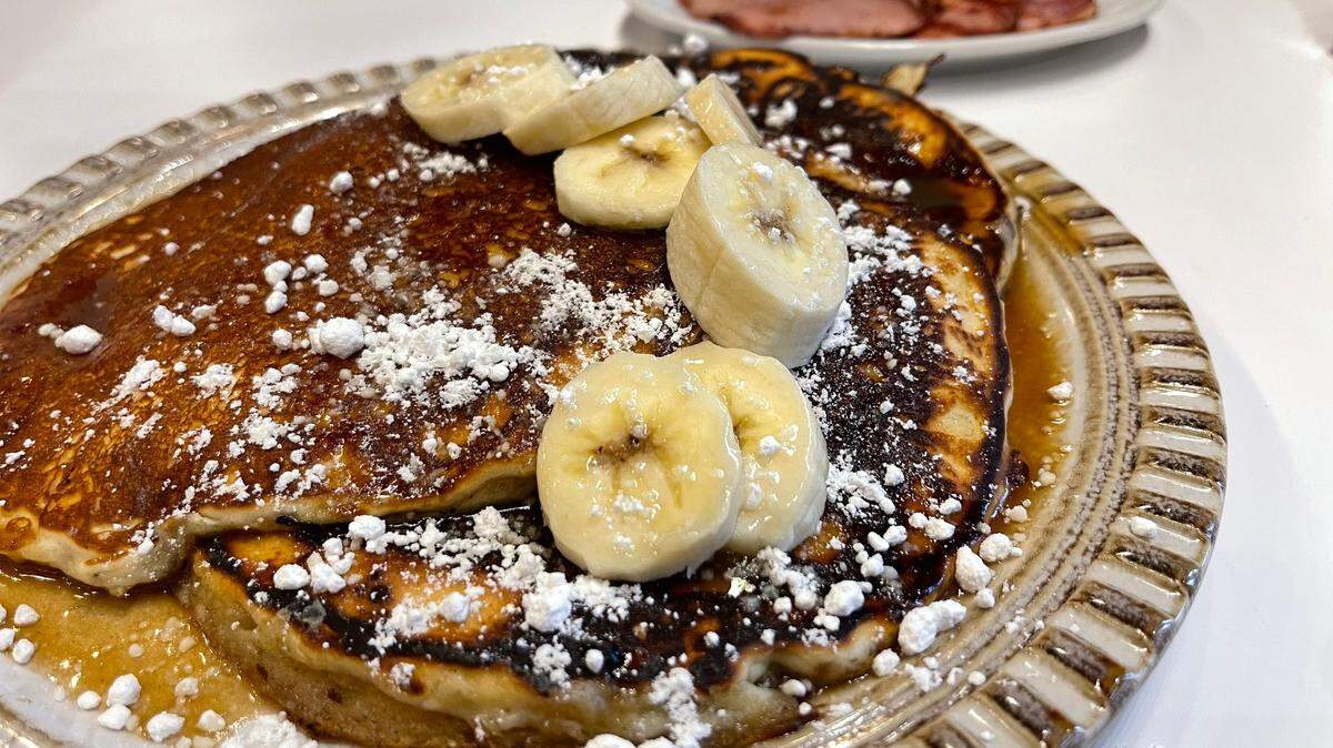 Bananas Foster pancakes with fresh bananas and caramel sauce are one of the choices for breakfast at Cosmos at Pearl Hotel in Bay St. Louis