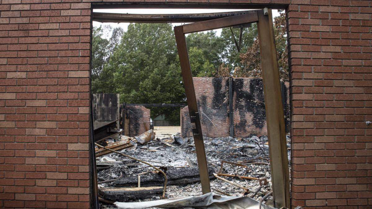 The remains of Miracle Temple Evangelistic Church of God in Christ after a fire on October 2, is photographed on Lakeshore Road Tuesday, October 9, 2019. This was also a polling location for voters in precinct 96.