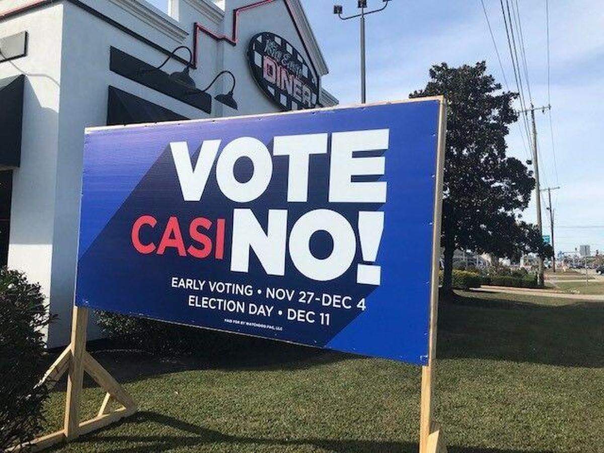 A anti-casino sign paid for by the nonprofit Watchdog PAC, LLC, in front a Slidell restaurant, one of many sprouting up along St. Tammany Parish road sides as the Dec. 11 election on a Slidell-area casino looms.