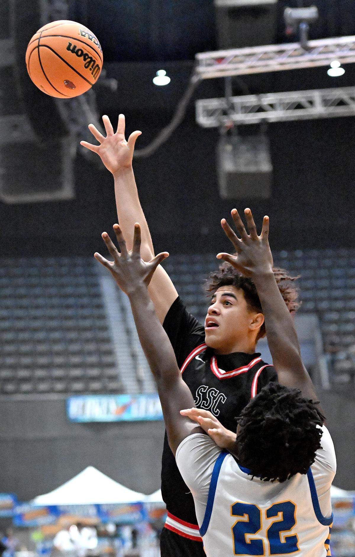 St. Stanislaus' Max Baria (5) shoots over a Quitman defender Saturday.