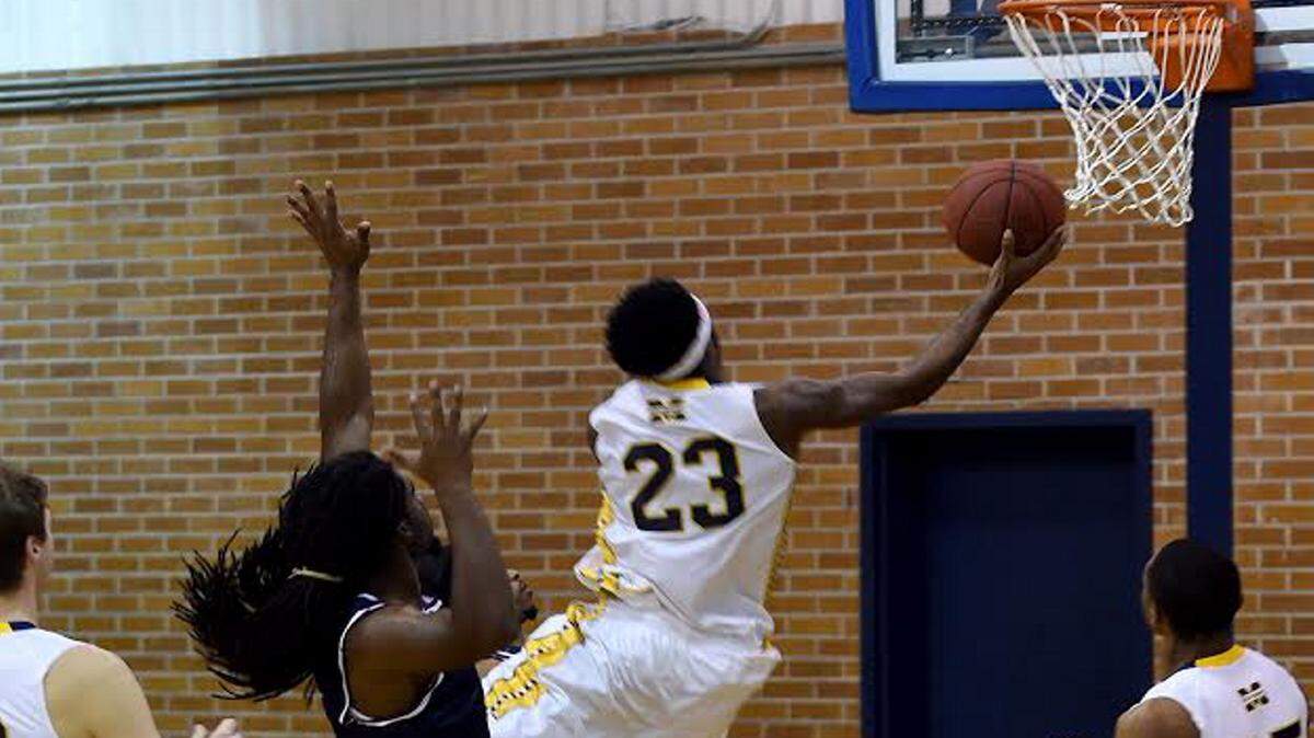 RICH KOPP/MGCCC 
 Mississippi Gulf Coast's Davion Cole-Johnson drives to the bucket against Southwest on Thursday in Perkinston.