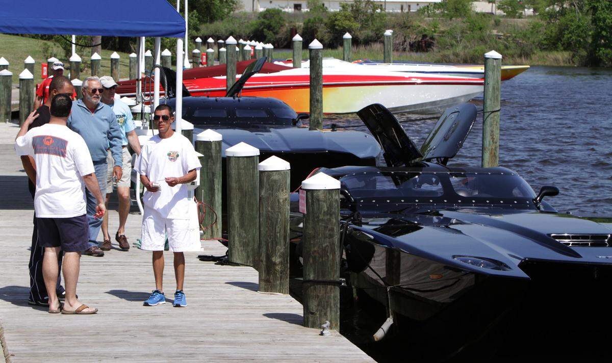 Spectators look at Smokin' the Sound boats at the Palace Casino docks in 2013. A boar show, entertainment and dance are proposed for a new race in April.