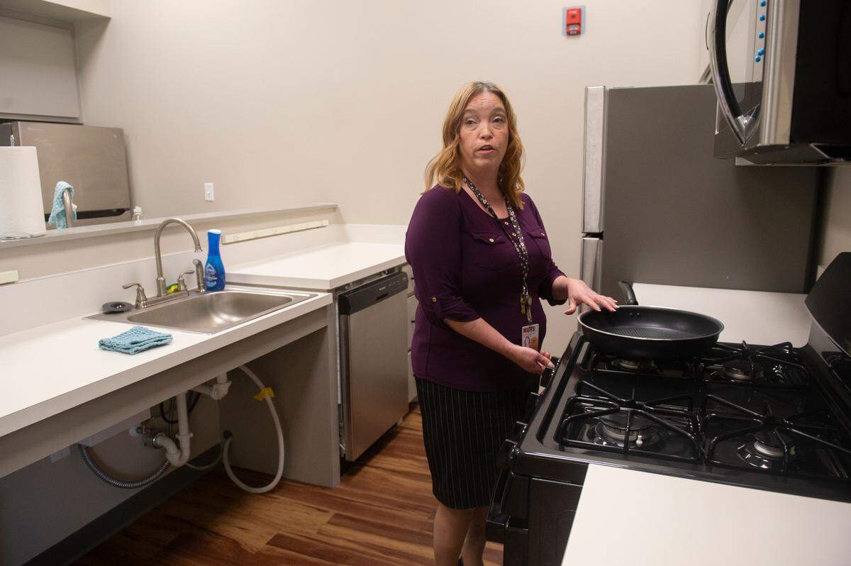 Renee Cornette, home management instructor at the Mississippi Emerge Center, demonstrates methods they use to teach blind students how to cook independently on Thursday, July 25, 2024.