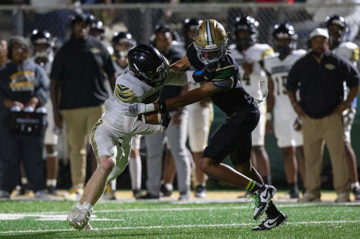 Poplarville’s Biggie Smith tackles Mendenhall during a playoff game between Poplarville and Mendenhall at Poplarville on Friday, Nov. 8, 2024.