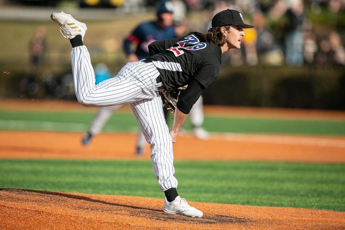 Southern Miss pitcher Garrett Ramsey throws a pitch during a game against Florida Atlantic University at Pete Taylor Park in Hattiesburg on Saturday, March 19, 2022.