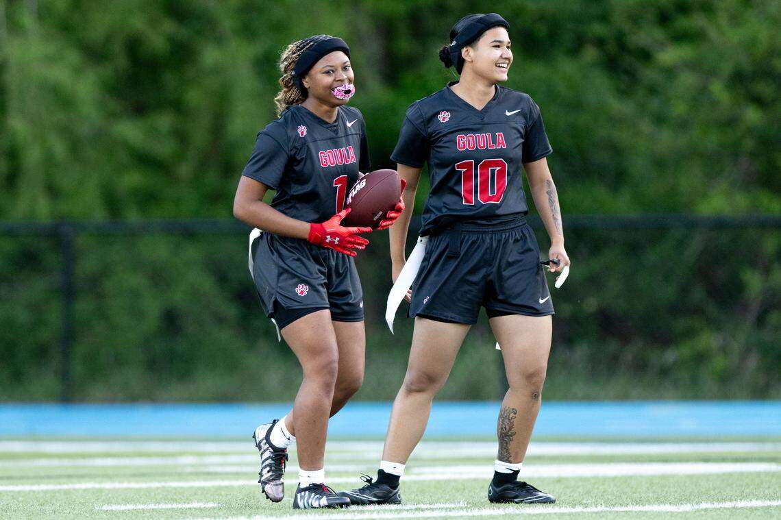 Pascagoula’s Asante Dawson (1) and Genesis Delgado (10) celebrate scoring a touchdown during a flag football game at Vancleave High School on Thursday, April 9, 2026.