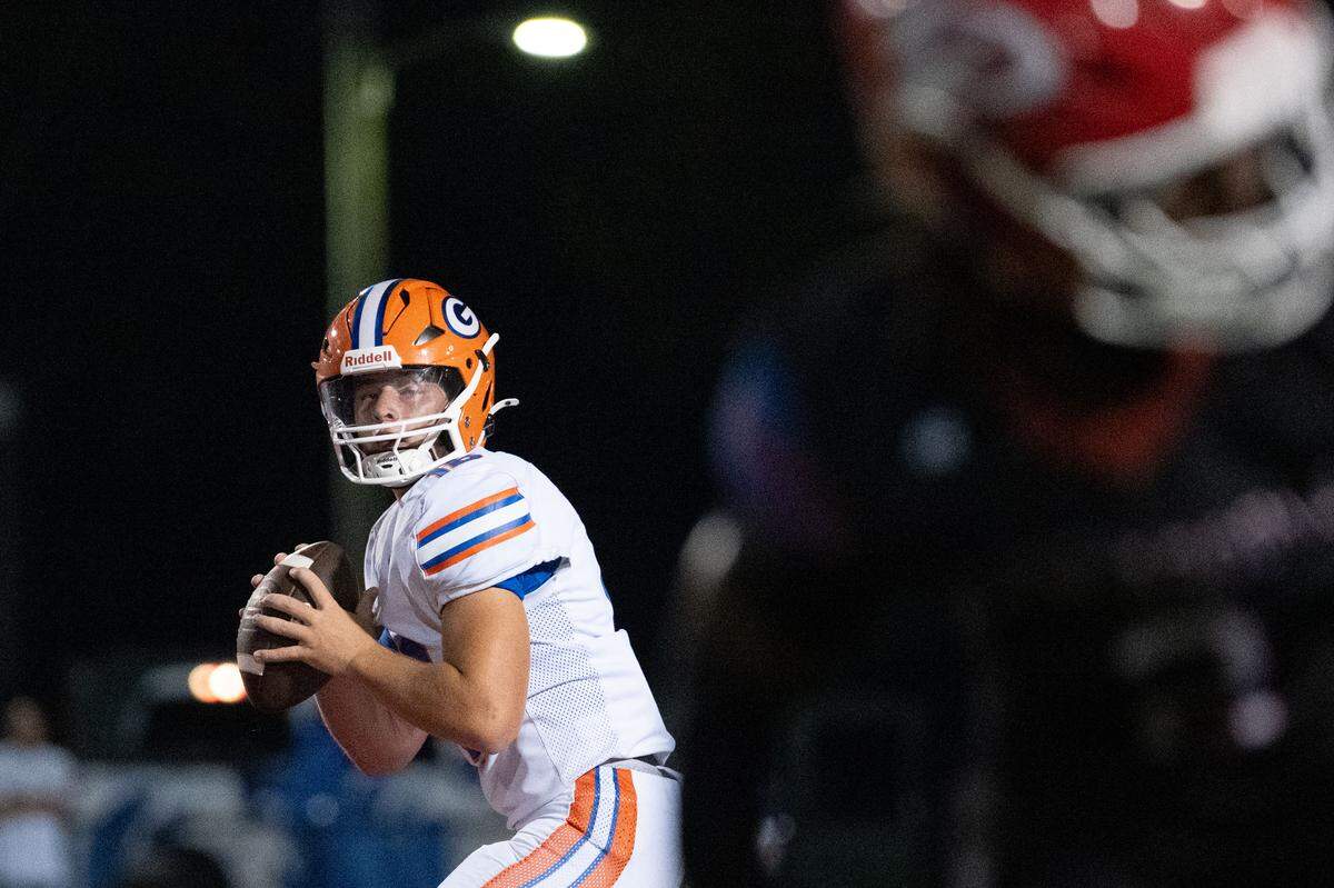 Gulfport quarterback Parker Nettles (16) looks to pass Friday in the Admirals’ victory.