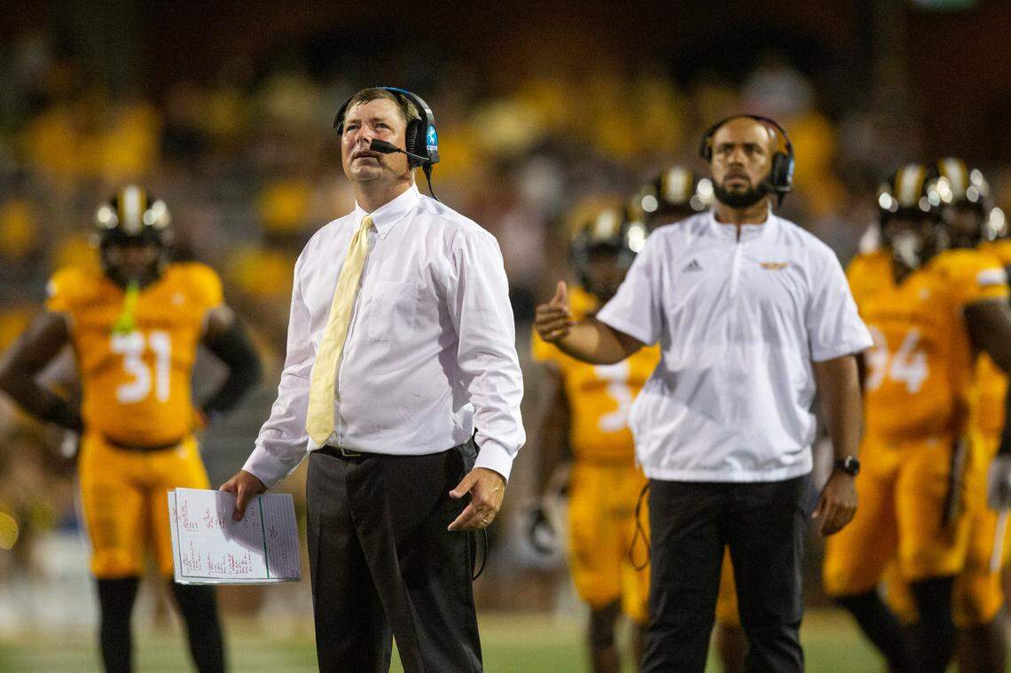 Southern Mississippi Head Coach Will Hall looks up at the scoreboard for a replay during the second half of an NCAA college football game in Hattiesburg, Miss., Saturday, Sept. 3, 2022. Southern Mississippi lost to Liberty 29-27. (Hannah Ruhoff/The Sun Herald via AP)