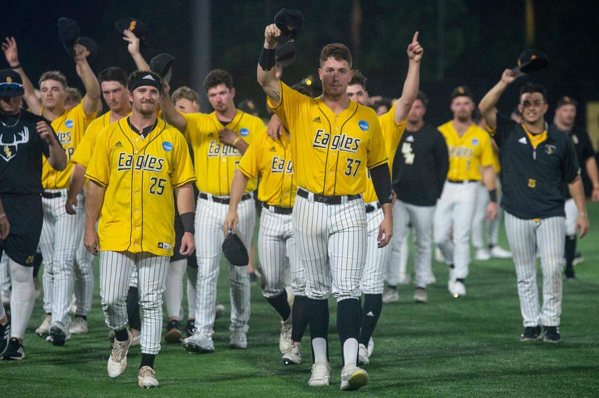 Southern Miss’ Carson Paetow leads his team members to the fans after Southern Miss lost to Tennessee in the NCAA Super Regional at Pete Taylor Park in Hattiesburg on Monday, June 12, 2023.