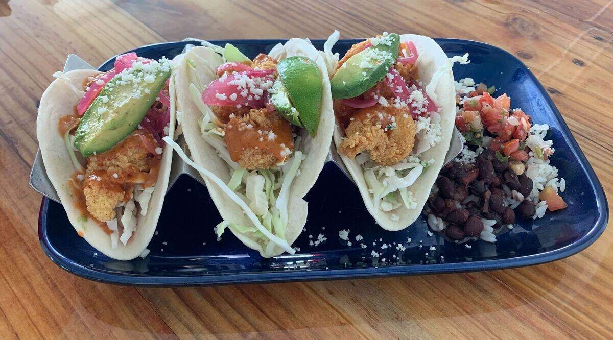 The order of Baja Shrimp Tacos at Flamingo Landing in Gulfport.