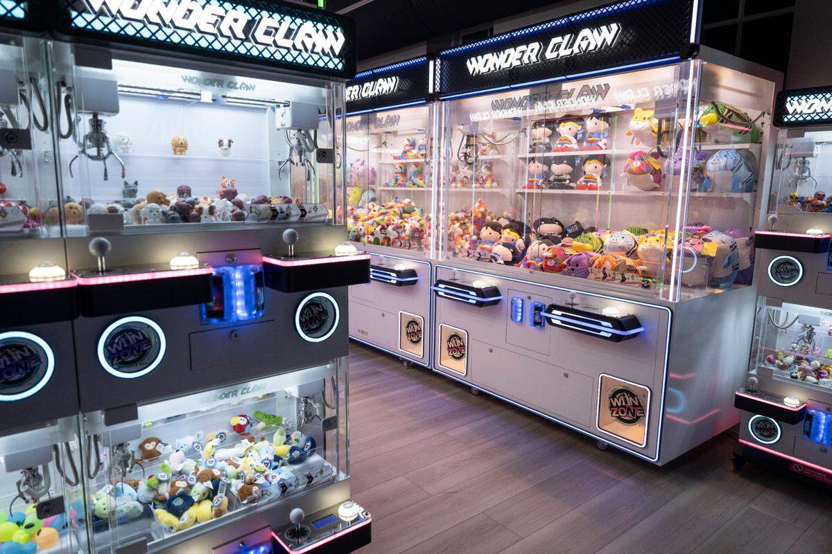 Claw machines at Hippie Fish at Centennial Plaza in Gulfport on Thursday, June 26, 2025.