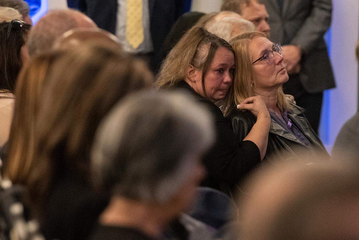 Steven Robin’s wife Amy reacts during the funeral of Bay St. Louis police officers Sgt. Steven Robin and Branden Estorffe at the Bay St. Louis Community Center in Bay St. Louis on Wednesday, Dec. 21, 2022. Robin and Estorffe were killed responding to a call at a Motel 6 on Dec. 14.
