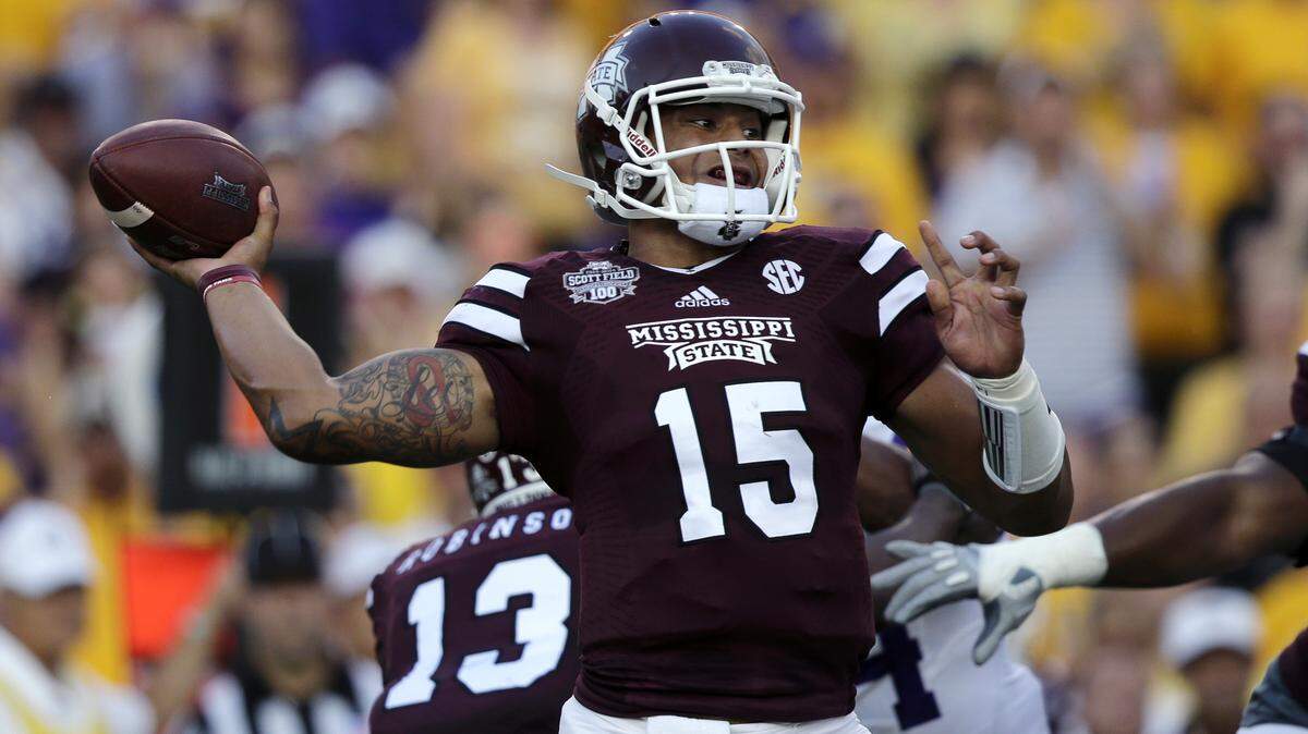 GERALD HERBERT/ASSOCIATED PRESS 
 Mississippi State quarterback Dak Prescott (15) will suit up for the Bulldogs for the final time in Wednesday's Belk Bowl.