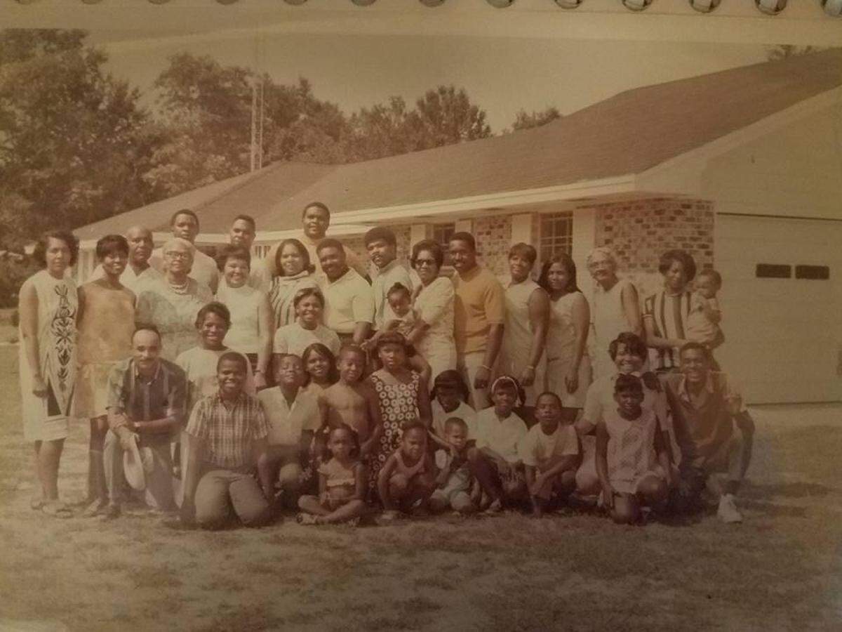 A family photograph taken at the home of Melissa Evans’s paternal grandparents, Ruth Breland Evans and Wilson Evans II, in the late 1960s. All of her grandmother’s siblings and their children are pictured.