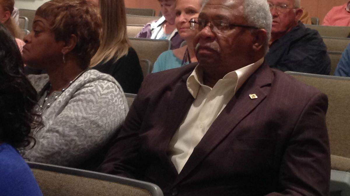 KAREN NELSON/SUN HERALD 
 Moss Point Mayor Billy Broomfield waits to go before the Jackson County Board of Supervisors on Monday to tell them to leave his city's menhaden industry alone. The county had asked the state to restrict menhaden fishing to one mile off the Jackson County coast to help with by-catch and the population of menhaden. Broomfield asked to board to back off that restriction. It will hurt the industry that pumps $40 million into Moss Point's economy, and besides, "nobody wants a menhaden anyway."