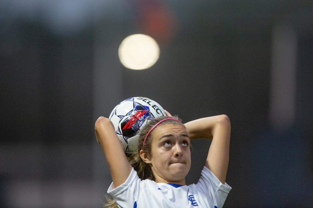 Ocean Springs’ Ashton Rainey throws the ball back in during the 6A South State Championship game in Gulfport on Tuesday, Jan. 31, 2023.