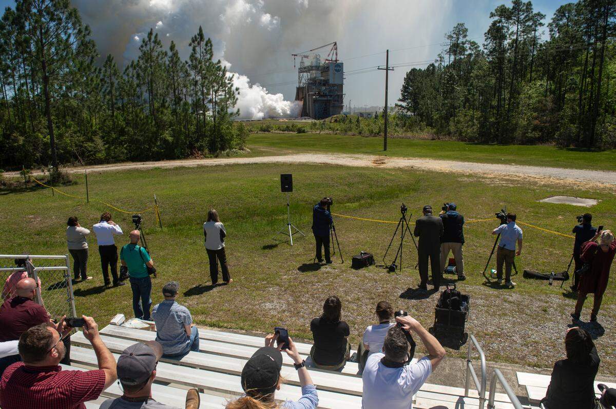 Guests, media and NASA employees watch as NASA tests an RS-25 engine at NASA’s Stennis Space Center in Bay St. Louis on Wednesday, April 3, 2024. The engines, which are destined for NASA’s Artemis missions back to the moon, are assembled and tested at Stennis.