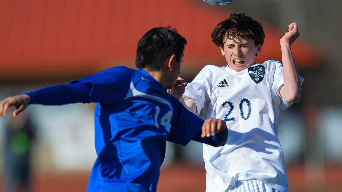 BOB SMITH/SPECIAL TO THE SUN HERALD 
 St. Patrick's Chris Collins (20 ) heads a ball during the MHSAA Soccer State 1A-2A-3A Championship held in Clinton Saturday February 6th 2016. (For the Sun Herald/Bob Smith)