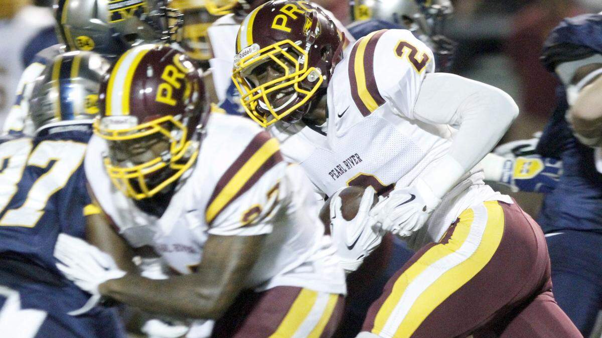 TIM ISBELL/SUN HERALD 
 Tarvarious Moore of Pearl River Community College returns a kick off against MGCCC, Thursday, Oct. 8, 2015.