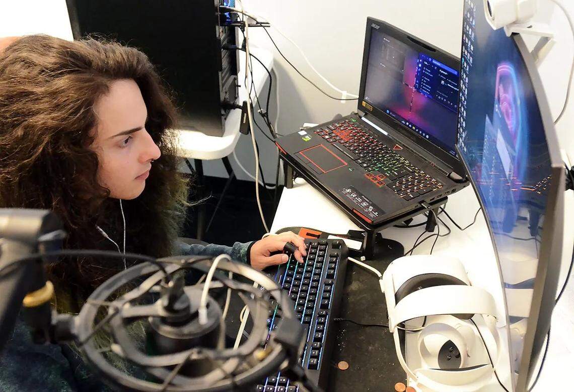 Dylan White, VR programmer at Lobaki, works on a project at the company earlier this month in Jackson.