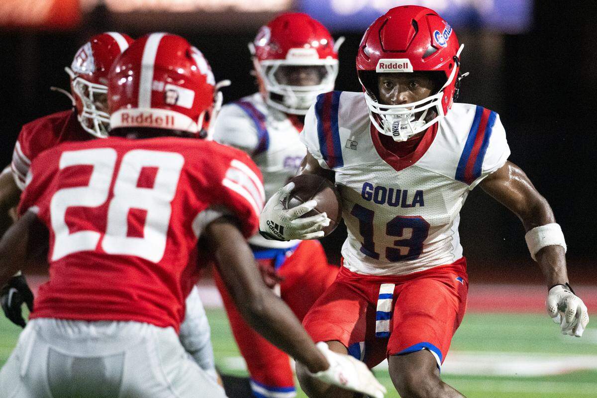 Pascagoula wide receiver Darius Carter (13) looks for room to run Friday in the Panthers’ loss to Biloxi.