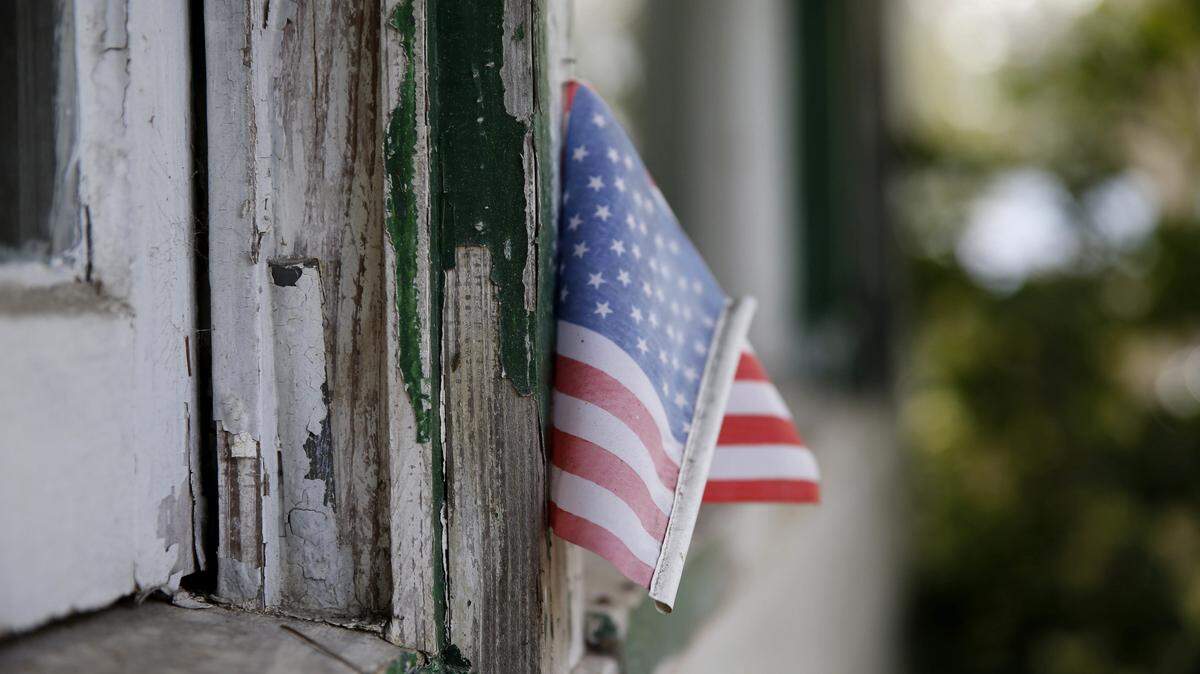 GERALD HERBERT/APIn this Dec. 11, 2015 photo, an American flag is seen outside the childhood home of Barbara Hicks Collins, now listed on the National Register of Historic Places, in honor of her father, civil rights activist Robert Hicks, in Bogalusa, La. The home was both the site of mobilization of civil rights activism, and the target of Ku Klux Klan hostility.