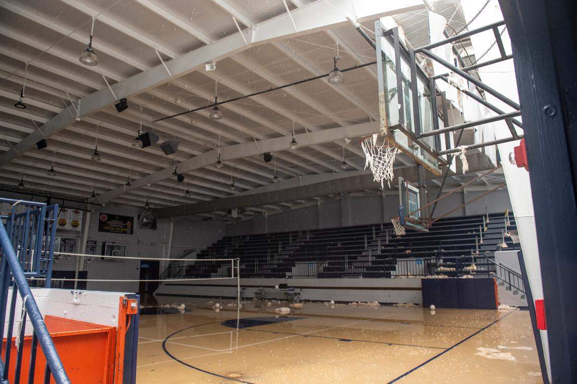 Rain falls into the gymnasium at Moss Point High School in Moss Point on Tuesday, June 20, 2023 after a tornado that struck the town Wednesday tore off part of the roof.