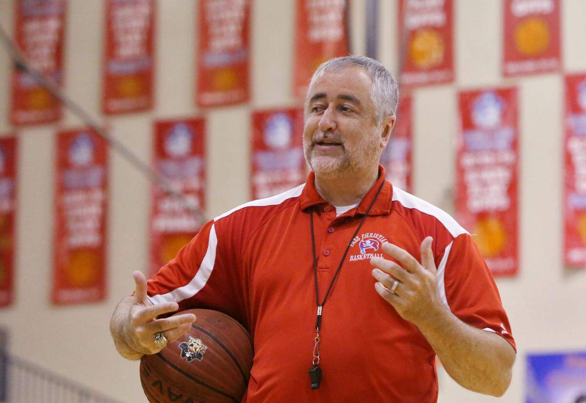 JOHN FITZHUGH/SUN HERALD Pass Christian head basketball coach Buddy Kennedy has hung many banners on their wall in his career there. He will soon reach the 500 victory milestone for his career.