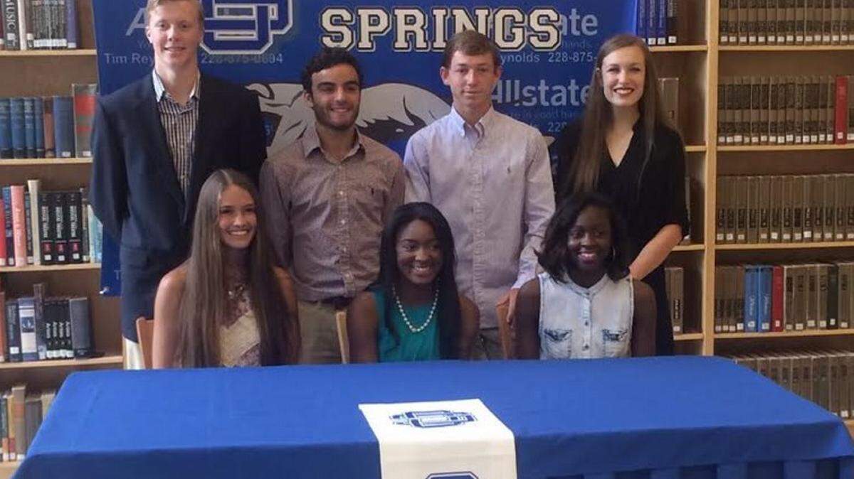 COURTESY OCEAN SPRINGS HIGH SCHOOL 
 Seven Ocean Springs athletes signed collegiate scholarships Wednesday. Travis Harper and Kyle Hillyard signed scholarships to Pearl River C.C.; Gage Johnson signed a soccer scholarship to Mississippi Gulf Coast C.C.; Shelby Guidry signed a dance scholarship to South Alabama; Amanda Kilduff signed a tennis scholarship to Samford and Quineitra McCullum and D.J. Blackston signed track scholarships to Meridian Community College.