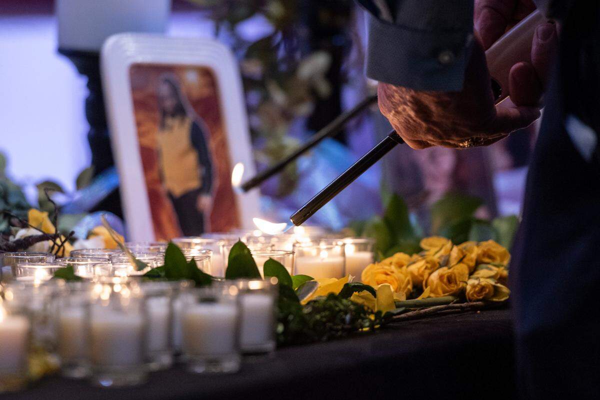 Law enforcement officers light candles in front of portraits of crime victims during a coast-wide candlelight ceremony as a part of National Crime Victims’ Rights Week at First Baptist Church of Gulfport on Tuesday, April 29, 2025.