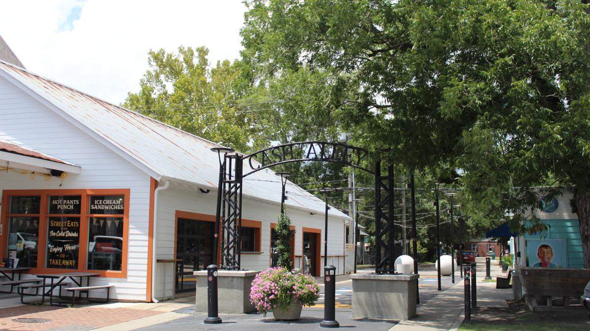 Ocean Springs officials removed the iconic Cash Alley umbrellas Thursday, prompting uproar on social media.