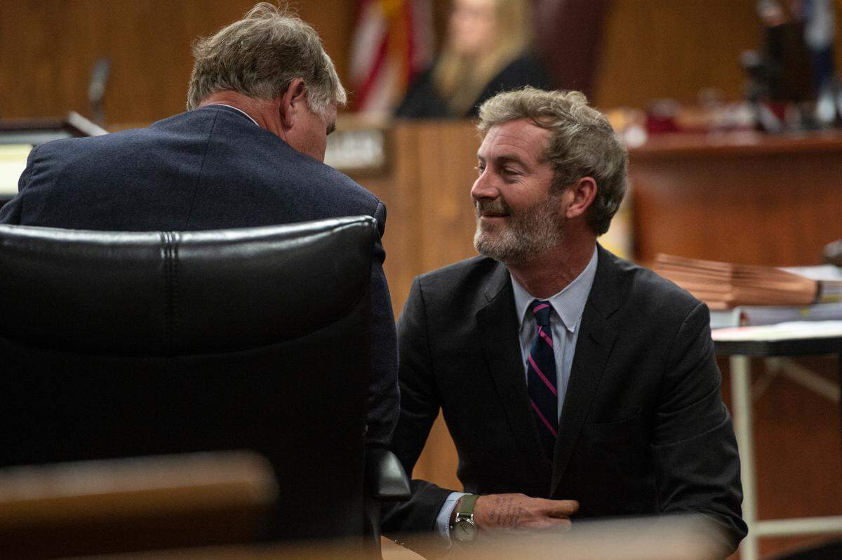 The defense team talks during the murder trial in which Jeremy Childress is accused of murdering Michelle Hester in Harrison County Court in Gulfport on Wednesday, June 21, 2023.