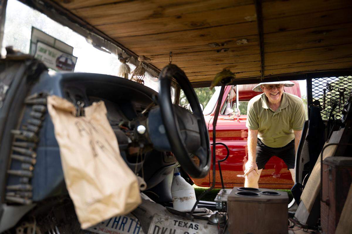 Event attendees check out cars parked in downtown Biloxi during the Biloxi Block Party on Wednesday, Oct. 8, 2025.