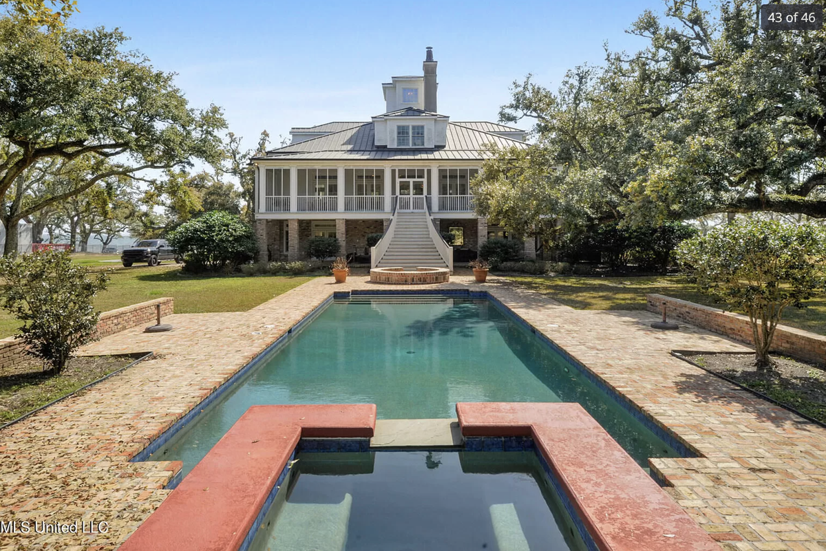 A home for sale for $4.9 million on E. Beach Boulevard in Pass Christian has a luxury pool.