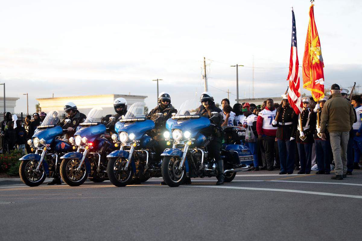 Police motorcycles line up to lead the Champions Christmas Parade in Gulfport on Monday, Dec. 8, 2025.
