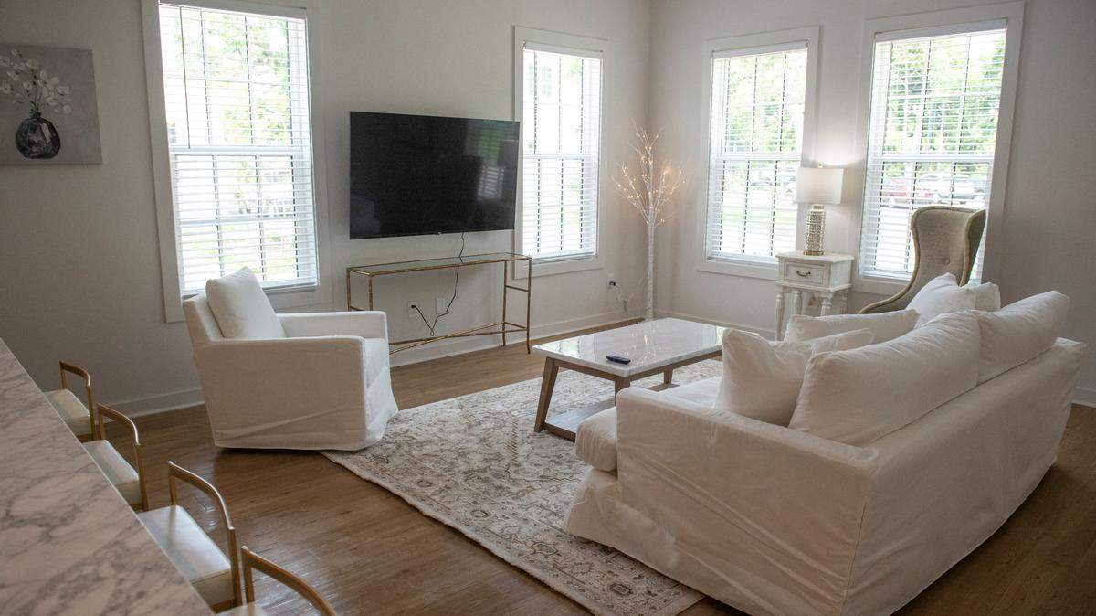 The living room of one of the short term rentals at Cottages by The Gulf on Tuesday, May 28, 2024. Cottages by The Gulf, which opened in March, features six short term rental units as well as twelve units that are owned or leased long term.