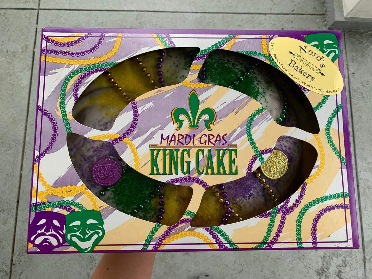 A wrapped king cake from Nord’s Bakery in Louisville, KY on Feb. 16, 2023. The popular bakery located by the University of Louisville is celebrating Mardi Gras season with special orders.