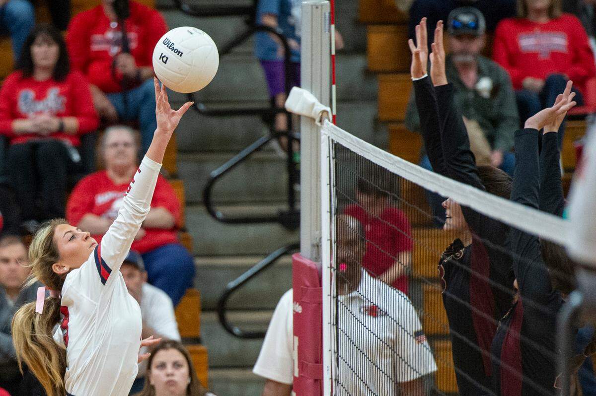 Hancock’s Lane Wedgeworth blocks the ball during the 6A South State Championship game at Hancock High School in Kiln on Monday, Oct. 16, 2023.