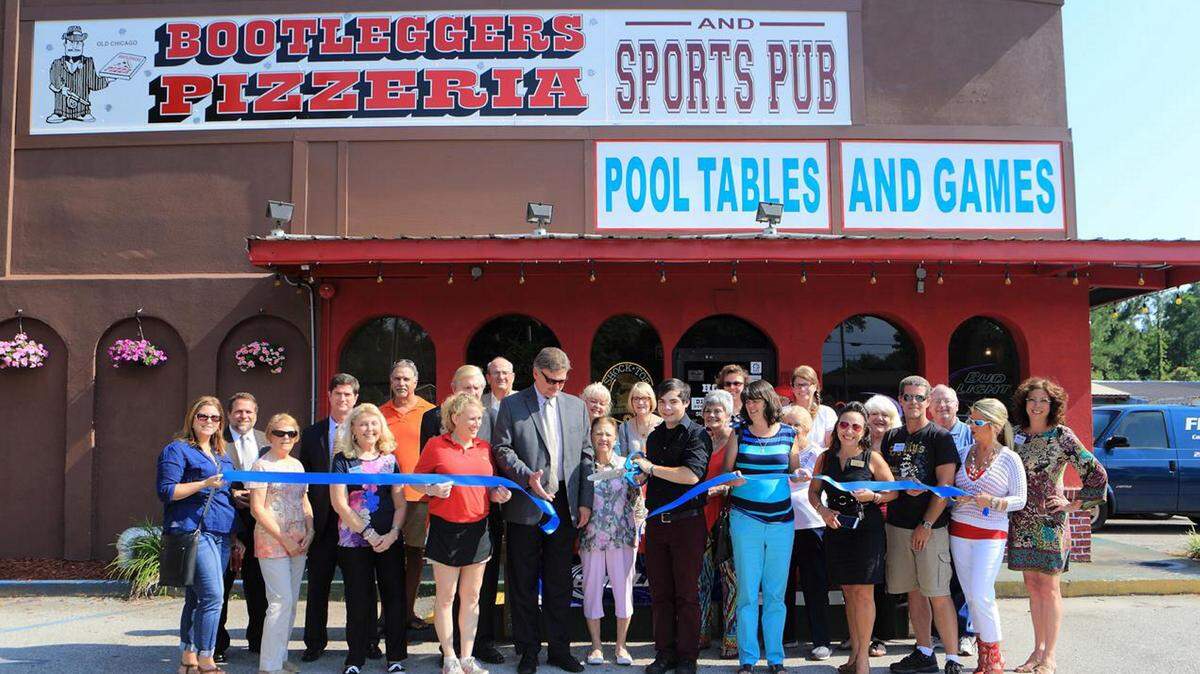 AJH PHOTOGRAPHY 
 Ribbon cuttings like this one in June at Bootleggers Pizzeria and Sports Pub on Pass Road in Biloxi are regular occurrances in South Mississippi. A new report shows small businesses support nearly half of all jobs in Mississippi.