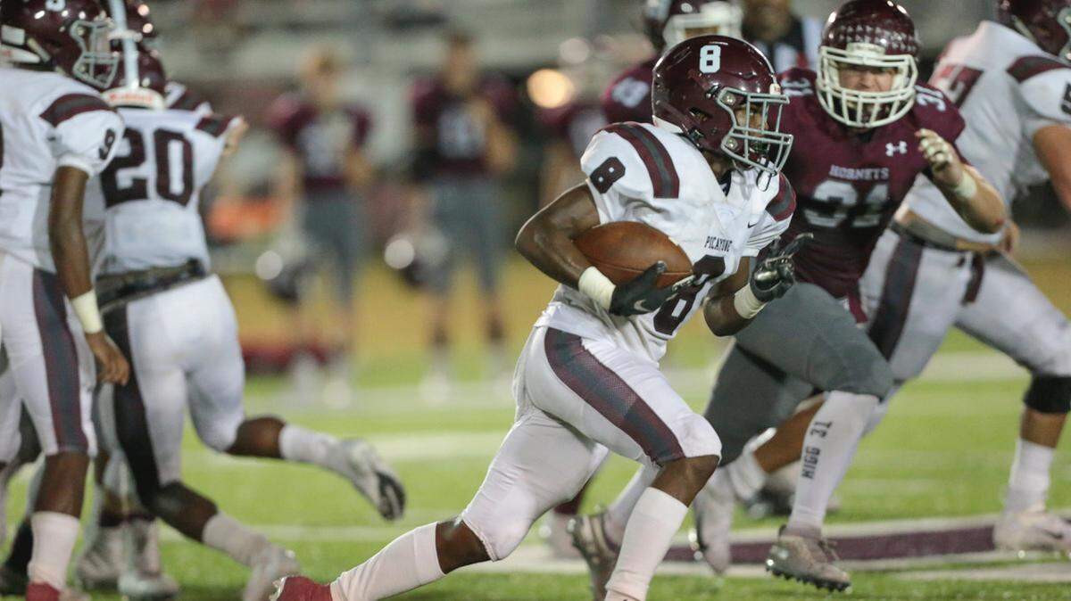 Picayune Cameron Thomas (8) takes it around the end during the game between East Central and Picayune at East Central, Friday, September 27, 2019.