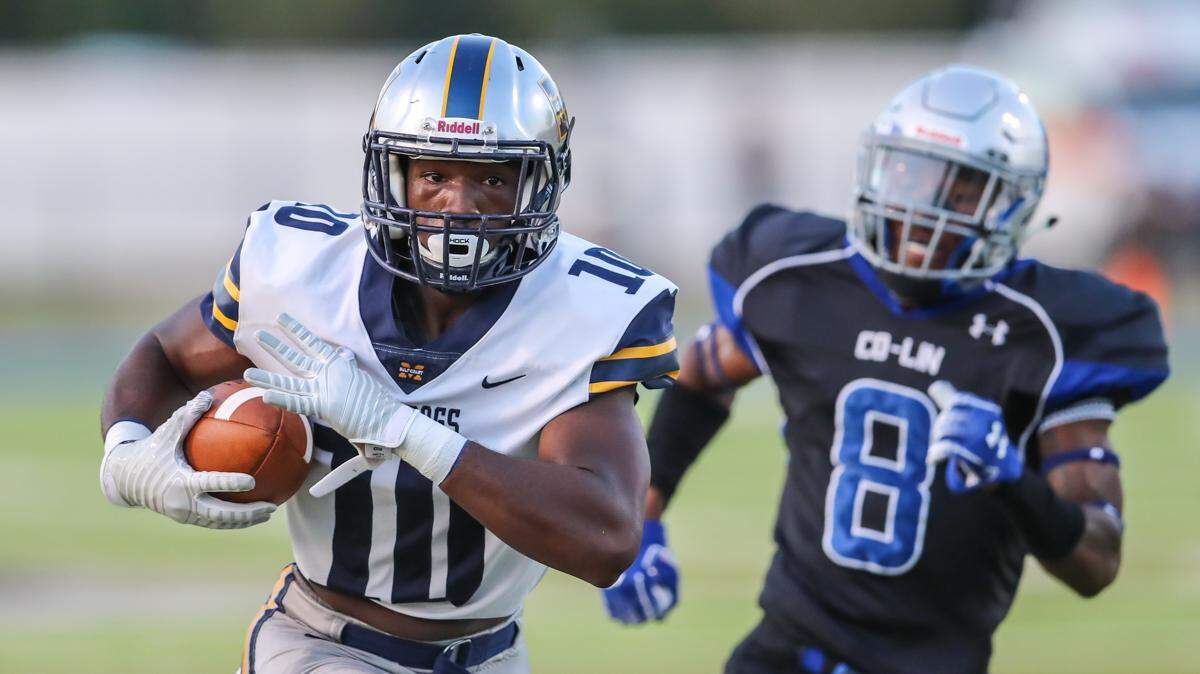 MGCCC receiver Marquise Bridges outruns Copiah-Lincoln cornerback Natrone Brooks during a game in Wesson on Thursday, Sept. 26, 2019.