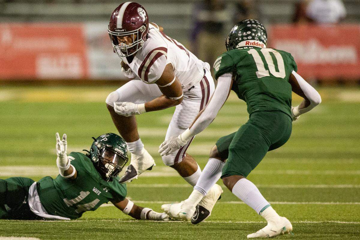 Picayune’s Dante Dowdell escapes tackle during the 5A State Championship at M.M. Roberts Stadium in Hattiesburg on Friday, Dec. 2, 2022.