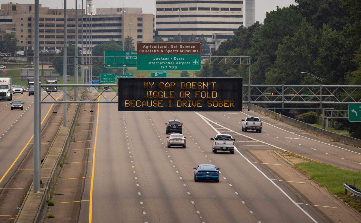 A sign submitted by a member of the public uses lyrics from the artists Duke & Jones and Louis Theroux to warn Mississippi motorists against drunk driving.