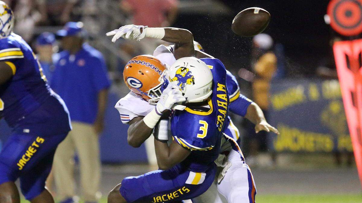 Gulfport’s Derick Hall knocks the ball out of St. Martin quarterback Tommie Johnson’s hand on Friday, September 21, 2018, at St. Martin. Hall is a top prospect for college recruiters.
