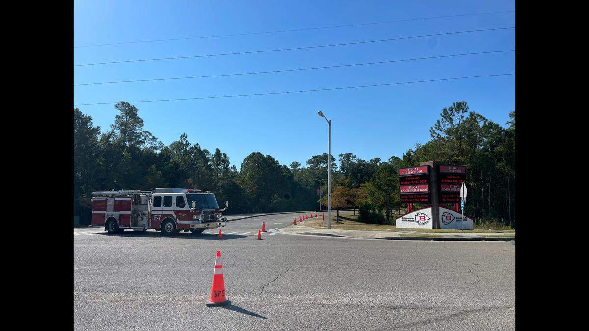 Biloxi firefighters block an entrance to Biloxi Jr. High and Biloxi High School on Friday.