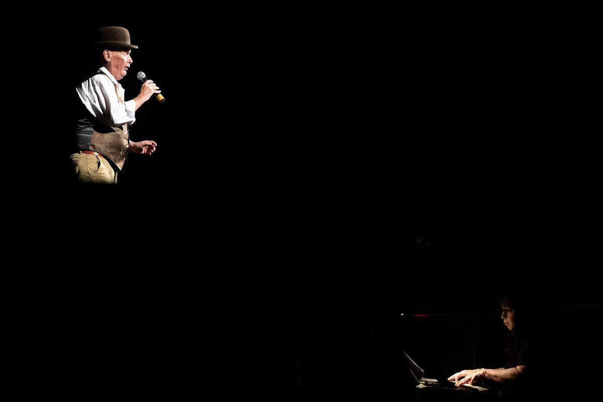 Jim Rux, left, performs as piano player, right, performs underneath the stage during a grand opening celebration at the Saenger Theatre in Biloxi on Saturday, June 6, 2026.