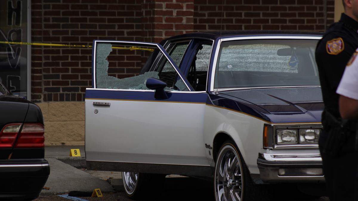 WESLEY MULLER/SUN HERALD 
 Leif Eric Dasco, 31, who police say sprayed bullets into a crowd outside Waveland's Barber College on Thursday, remained at large Friday afternoon. The gunfire wounded one person and left bullet and window damage in cars and the building.